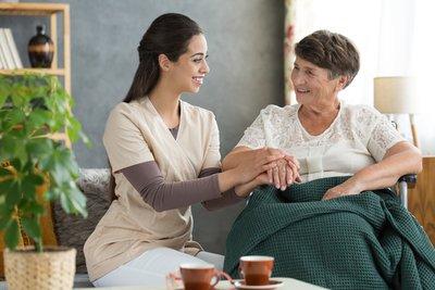 An in-home nurse with a patient