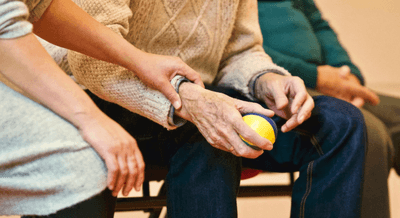 Person Holding a Stress Ball