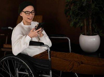 Girl in wheelchair on the phone